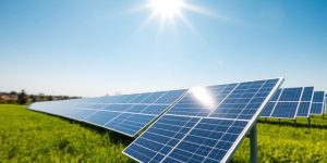 Solar panels in a sunny landscape promoting clean energy.